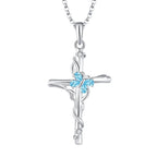 Silver blue gemstone cross necklace featuring delicate vine design with three light blue and clear stones sterling silver women