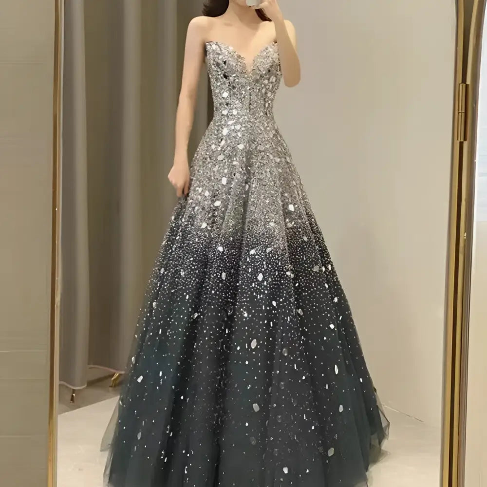 Blue heavy industry wedding evening dress featuring a shimmering silver strapless sweetheart sequin ball gown