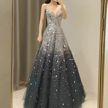 Blue heavy industry wedding evening dress featuring a shimmering silver strapless sweetheart sequin ball gown