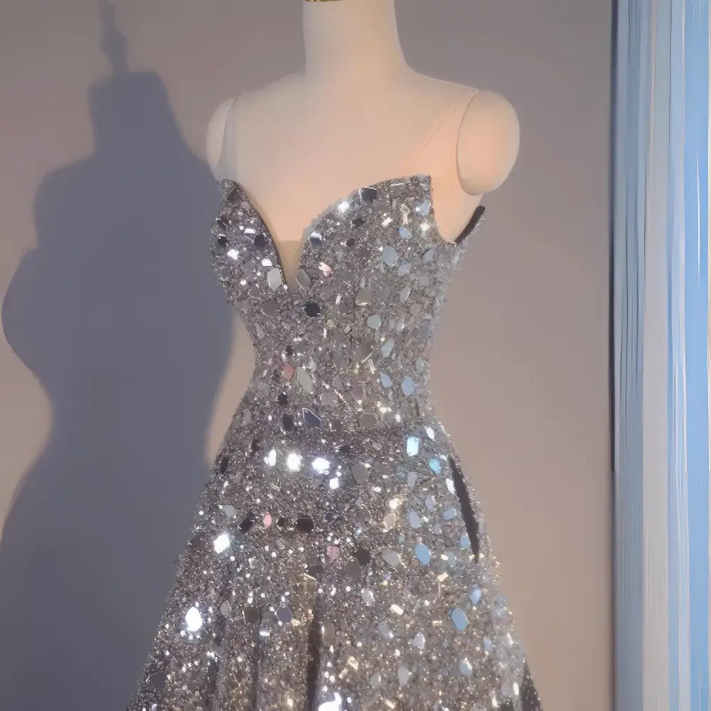 Blue heavy industry wedding evening dress featuring a shimmering silver strapless sweetheart sequin ball gown