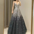Blue heavy industry wedding evening dress with a shimmering silver-to-black sequin strapless sweetheart gown