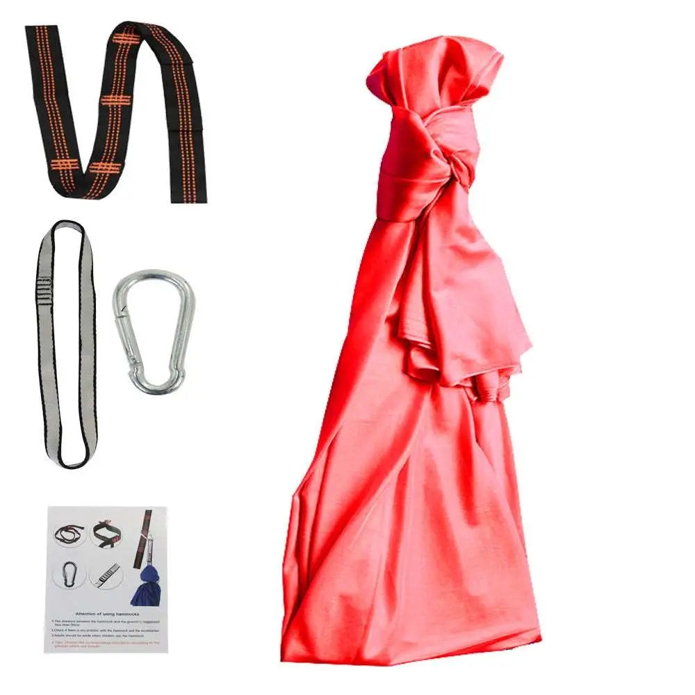 Blue indoor outdoor therapy swing with vibrant coral satin hammock sling and daisy chains for cuddle swing use