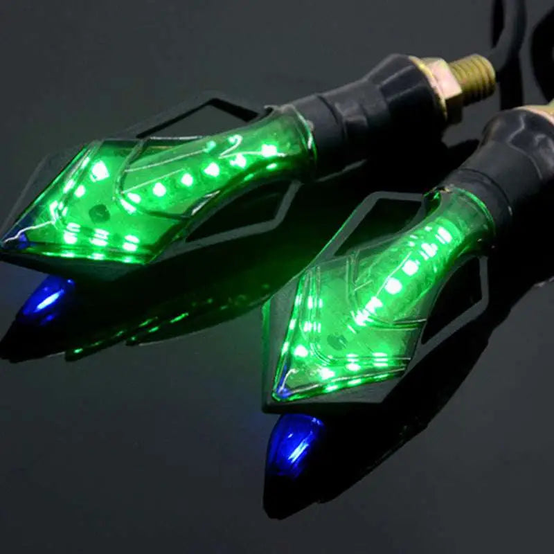 Green led motorcycle turn signals with a sleek angular design and black mounts for blue led motorcycle modification accessories