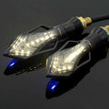Black and clear led motorcycle turn signals with blue tipped ends featuring sleek angular design for motorcycle modification accessories