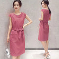 Pink sleeveless knee-length dress with tied waistband and front pockets in petite fashion lace-up student dress style