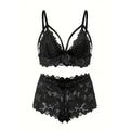 Black lace lingerie set with floral detailing and scalloped shorts featuring satin ribbon in a plus size underwear mesh suit
