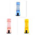 Blue pink and yellow portable electric fruit juicer usb rechargeable mixer bottles with transparent bodies and matching lids