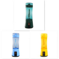 A sleek teal and dark green usb rechargeable mixer electric fruit juicer with a black power button on its base