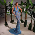 Blue shimmering turquoise sequined slimming party stage host mermaid gown with plunging neckline and cut-out detail