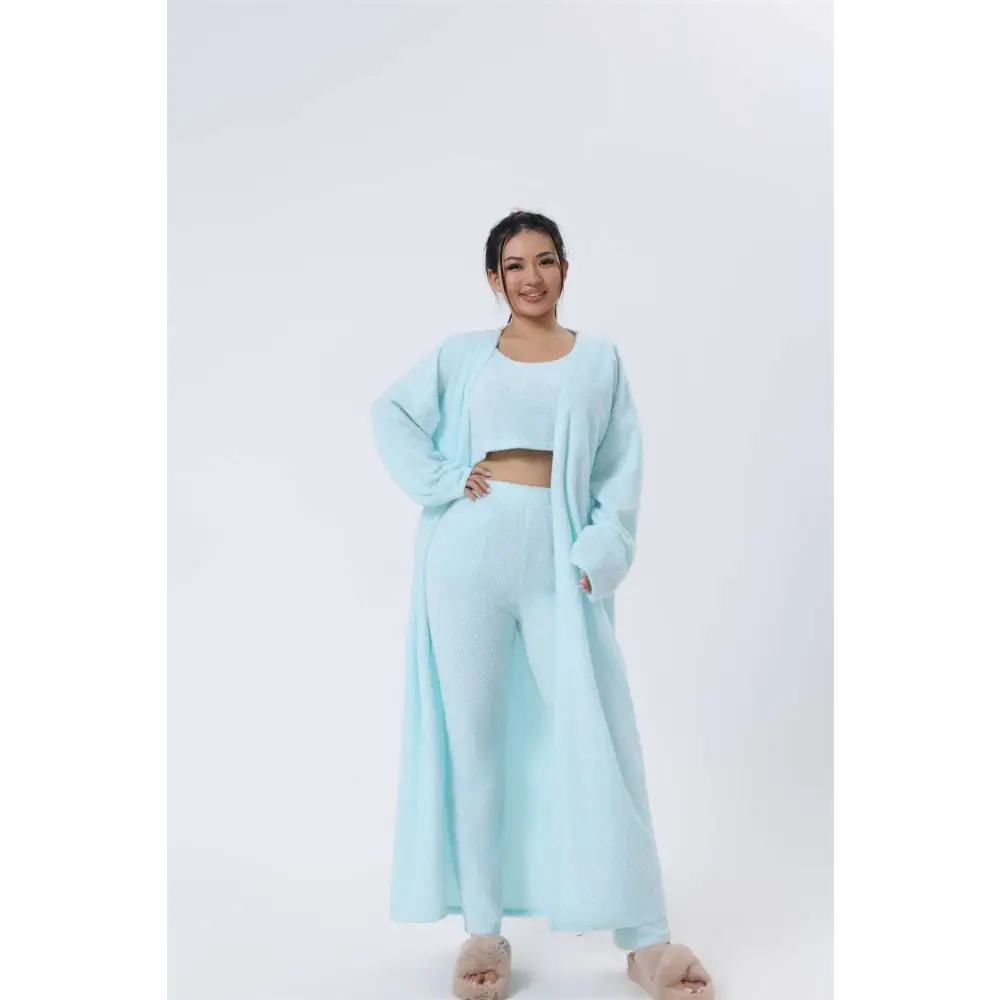 A soft light blue knit cardigan with long sleeves and relaxed fit from the blue shimmer cozy pajama set with square neckline