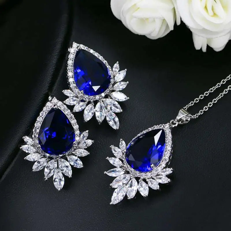 Elegant blue teardrop AAA jewelry set with royal blue gemstones and clear crystals in a leaf-inspired design for dinner