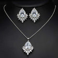 Elegant silver-toned blue teardrop AAA jewelry set with teardrop pendant and matching leaf design earrings for dinner