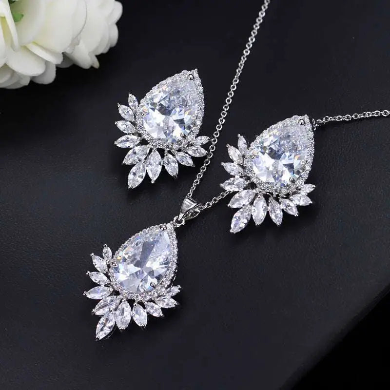 A sparkling silver blue teardrop aaa jewelry set with a central teardrop gemstone and marquise-cut crystals for dinner