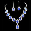 Elegant blue teardrop bridal jewelry set necklace with silver-toned metal and sparkling color rhinestone accents