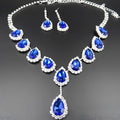 Elegant blue teardrop bridal jewelry set with color rhinestone crystals on silver chain and matching earrings