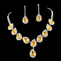 Elegant gold-toned blue teardrop bridal jewelry set with color rhinestone crystals and vibrant amber stones