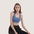 Blue women’s halter yoga vest with thin straps and scoop neckline ideal for halter yoga practice and fitness activities