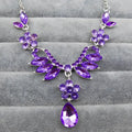 A sparkling purple gemstone necklace with silver floral marquise clusters and teardrop pendant in blue zircon trade explosion bride jewelry set