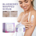 Oceaura blueberry whipped scrub in a white jar with purple labeling and light blue exfoliating body brightener inside