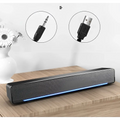 Black rectangular bluetooth dual-mode soundbar with textured gray grille and glowing blue led strip upgrade