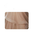 Blush beaded tulle luxury evening dress featuring a delicate blush pink skirt with shimmering champagne-colored blush embellishments