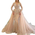 Blush pink beaded simple wedding dress featuring a champagne mermaid gown with gold lace and long sheer sleeves
