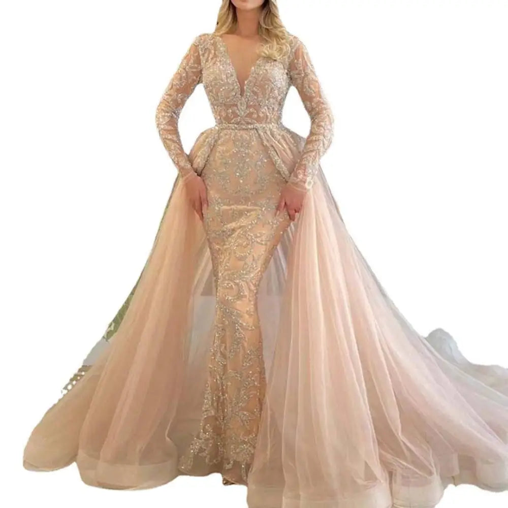 Blush pink beaded simple wedding dress featuring a champagne mermaid gown with gold lace and long sheer sleeves