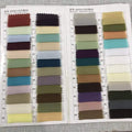 A fabric swatch catalog displaying multiple color options for 100d chiffon material in a blush pink lace long prom dress slit