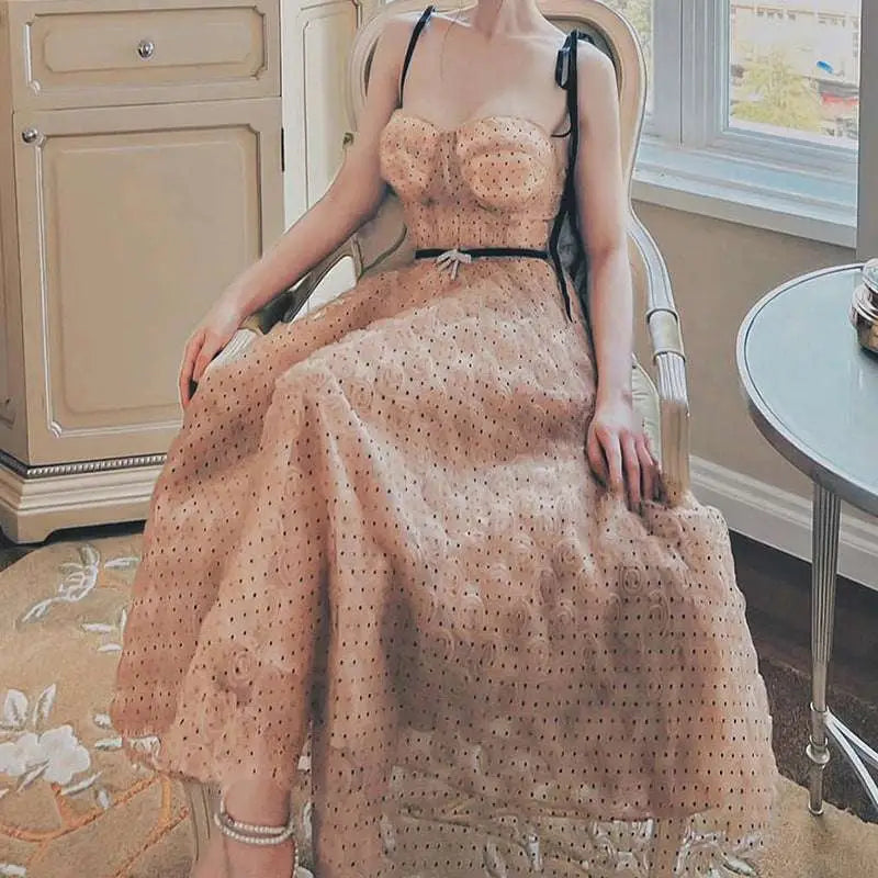 Blush pink lace slim drawstring dress with black polka dots featuring thin straps and a fitted bodice