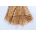 A blush pink lace slim drawstring dress with a tan lace skirt featuring rose appliqués and black polka dots