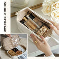 Cream-colored fabric travel cosmetic bag with zipper closure and transparent pocket for double storage blush pink large