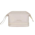 Cream-colored travel cosmetic bag with two compartments and subtle embossed text in a blush pink large capacity style