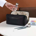 Black textured travel cosmetic bag with gold lettering rose of no mean land for blush pink large makeup bag use