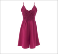 A blush pink romper image featuring vibrant magenta color with delicate lace bodice and thin spaghetti straps for luxury women’s fashion