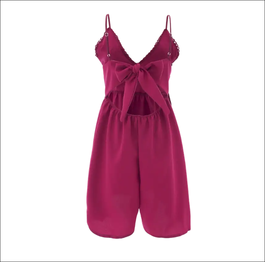 Blush pink romper image featuring vibrant magenta fabric with delicate lace trim and a matching front bow in luxury women’s fashion