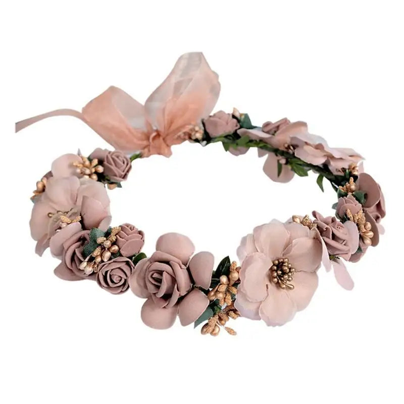 Blush rose wedding garland flower crown with fabric roses, green leaves, gold beads, and a sheer ribbon bow