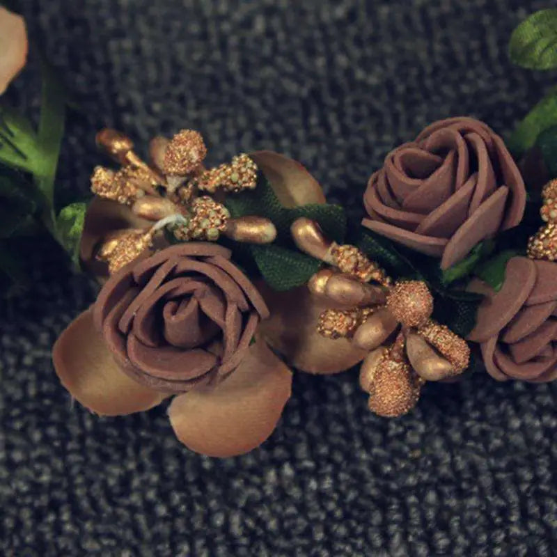 Blush rose wedding garland flower crown featuring delicate brown foam roses with gold glitter and green leaves