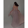 A blush sequined backless evening dress with a shimmering texture and delicate crisscross back straps shown from the back