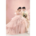 A blush tiered photography pettiskirt colored mesh dress with voluminous pink layers and a sweetheart neckline