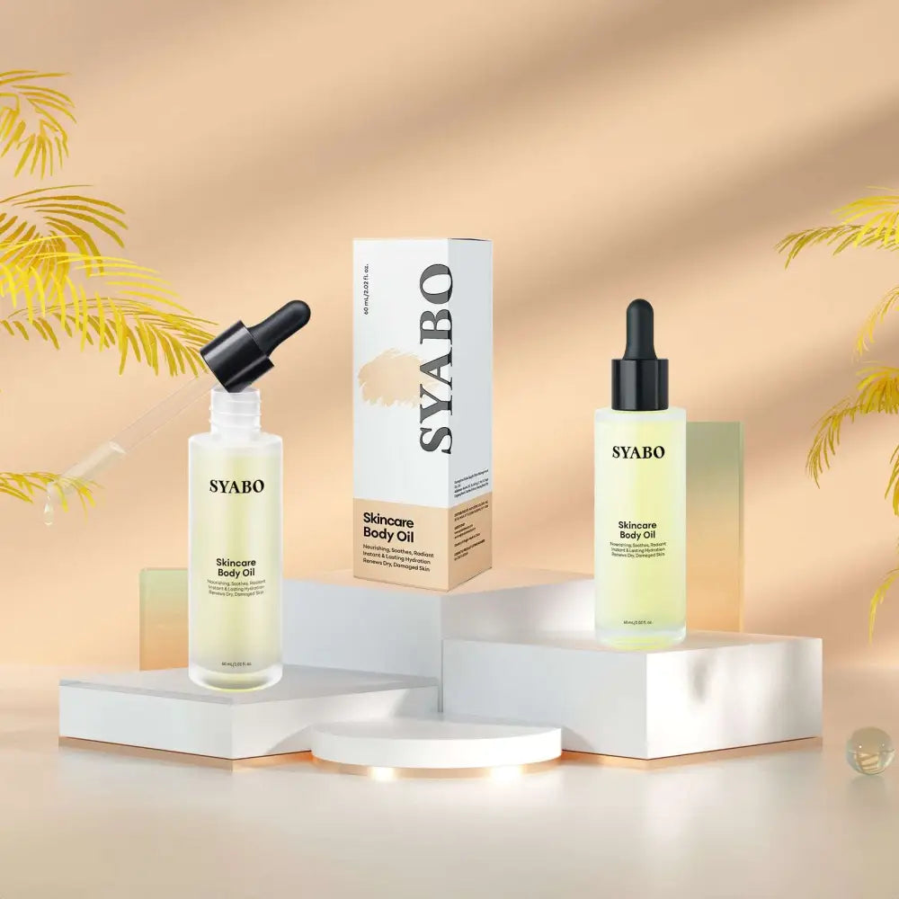 Syabo skincare body care essential oils in a clear glass bottle with black dropper cap and pale yellow liquid