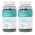Two clear plastic bottles with teal and white labels containing 60 dark green capsules of body deodorizing supplement