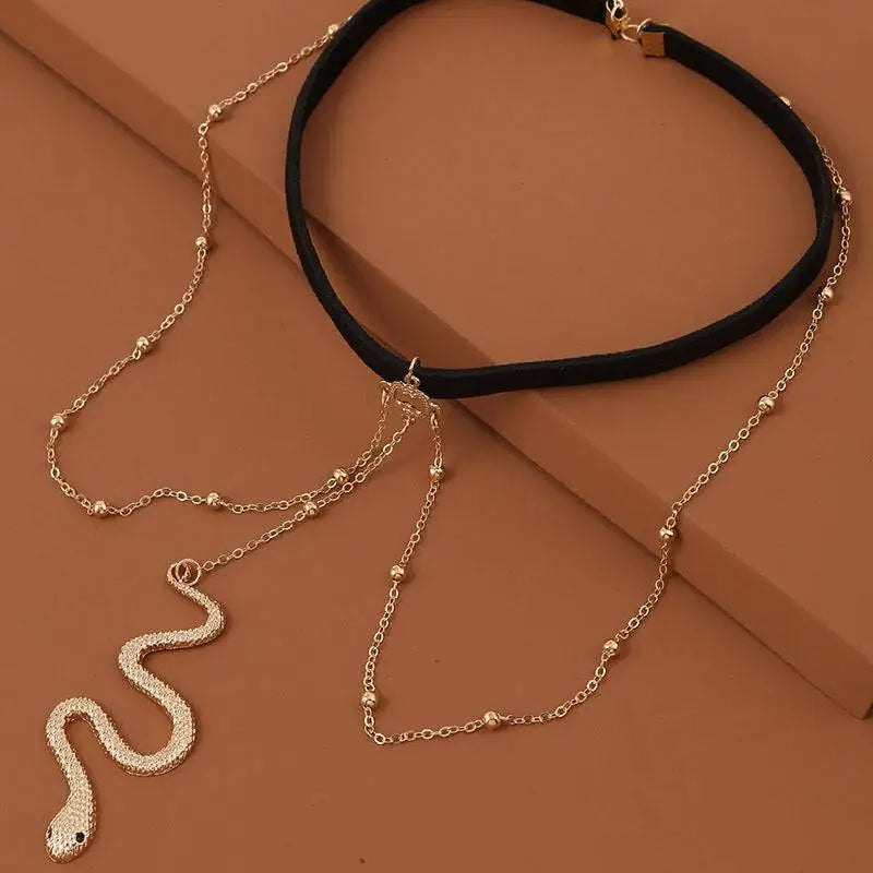 Gold snake pendant necklace with black choker strap and beaded chains bohemian boho gold snake leg chain jewelry