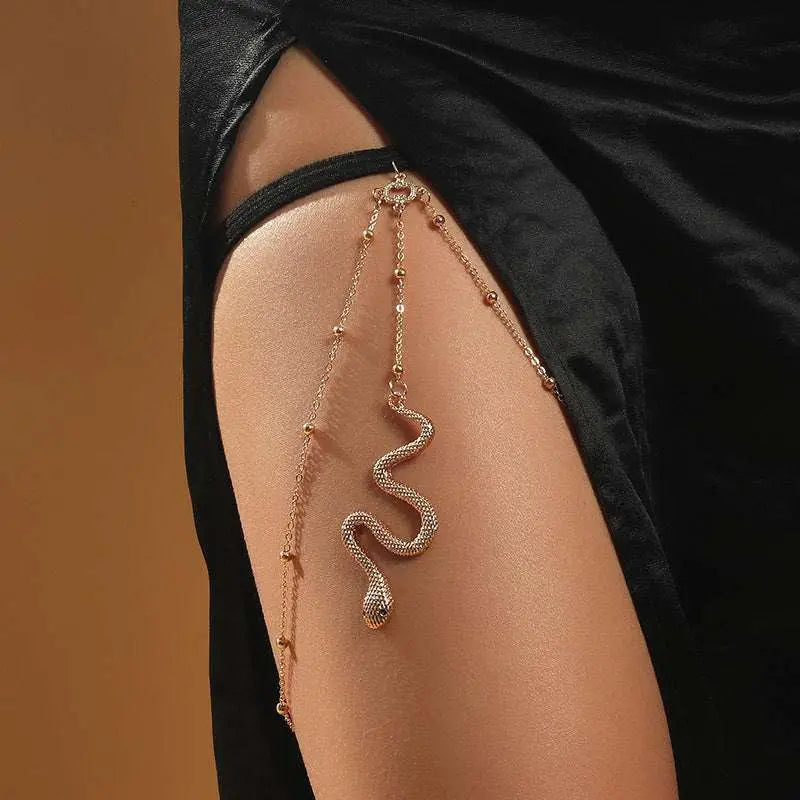 Delicate rose gold bohemian boho gold snake leg chain with textured scaly design and small spherical beads leg chain jewelry