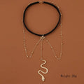 Black velvet choker necklace with gold-toned bohemian boho gold snake pendant and beaded leg chain jewelry