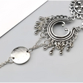Silver-toned crescent moon pendant necklace with filigree and teardrop charms in bohemian jewelry antique style foot chain featuring flower design