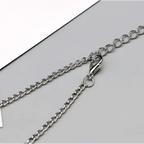 Silver-toned bohemian jewelry antique foot chain featuring a sleek interlocking oval link design with polished clasp