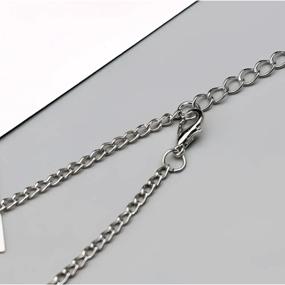 Silver-toned bohemian jewelry antique foot chain featuring a sleek interlocking oval link design with polished clasp