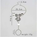 Silver-toned bohemian jewelry antique flower foot chain with floral and crescent moon charms and dangling pendant