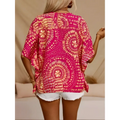 A vibrant pink and gold orange bohemian-patterned style batwing sleeve kaftan top for vacation wear