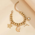 Gold-toned chunky chain bracelet with conch dolphin starfish charms from boho choker necklace bracelet set